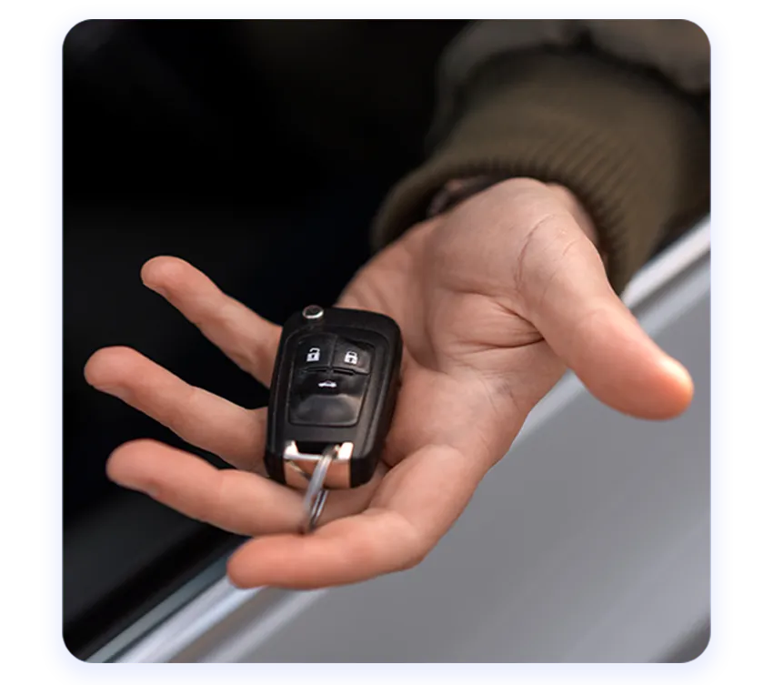 Closeup of locksmith using lock picks on a door lock